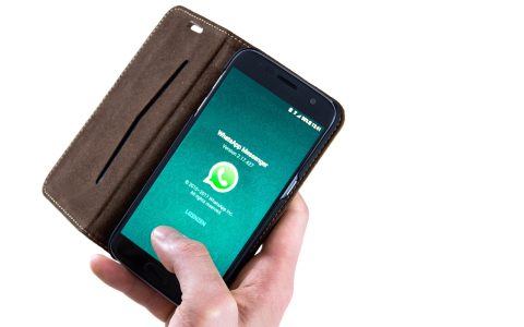 whatsapp網頁版消息管理界面，展示搜索框、归档对话列表与星标消息入口，深蓝色调整洁